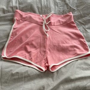 Women’s pink and white athletic shorts L